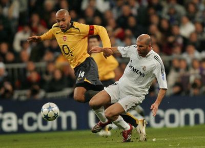 Henry takes on Zidane.