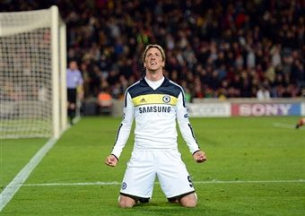 Fernando Torres celebrates his clinching goal against Barcelona. Cue Gary Neville 'goalgasm'