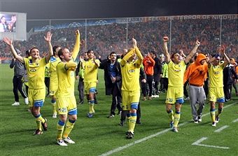 APOEL Nicosia celebrate a famous win over mighty Lyon.